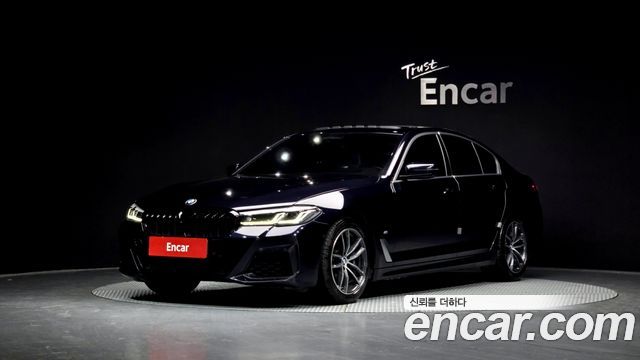 BMW 5-Series 2023 — photo 1