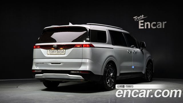 Kia Canival 2021 — photo 2