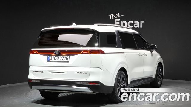 Kia Canival 2021 — photo 2