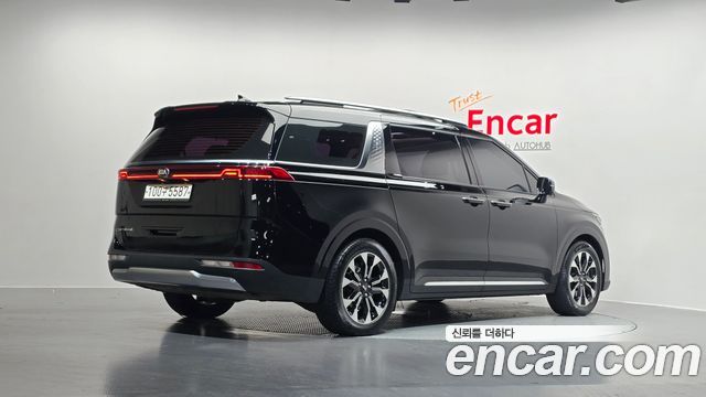 Kia Canival 2021 — photo 2