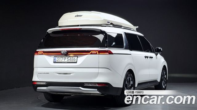 Kia Canival 2021 — photo 2