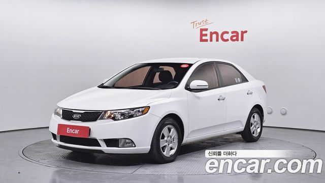 Kia Porte 2011 — photo 1