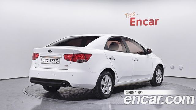 Kia Porte 2011 — photo 2