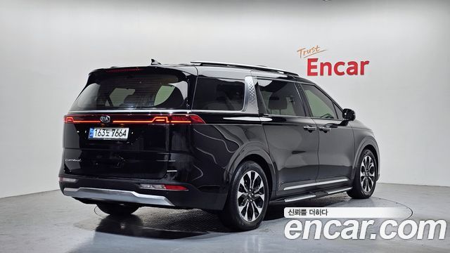 Kia Canival 2021 — photo 2