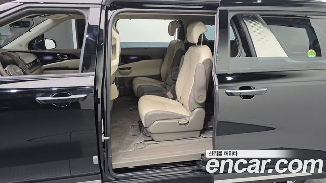 Kia Canival 2023 — photo 11