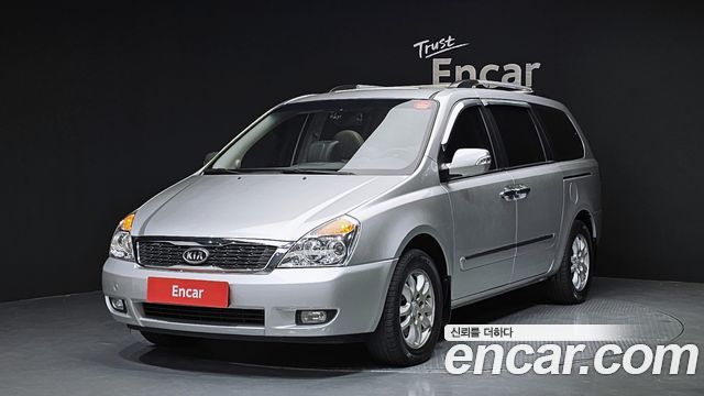 Kia Canival 2011 — photo 1