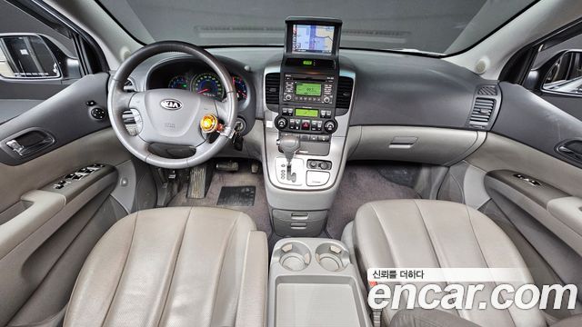 Kia Canival 2011 — photo 7
