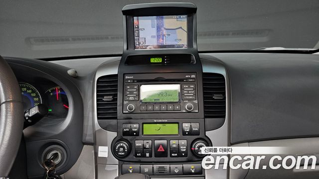 Kia Canival 2011 — photo 10