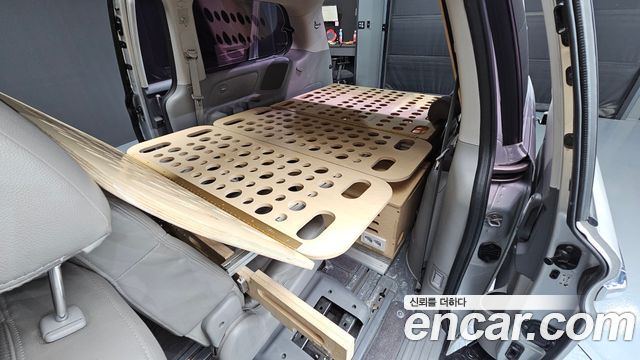 Kia Canival 2011 — photo 18