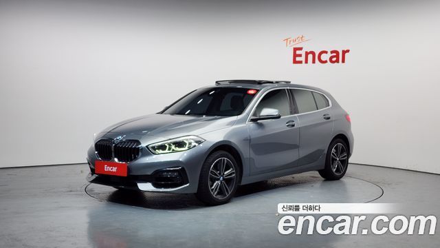 BMW 1-Series 2023 — photo 1