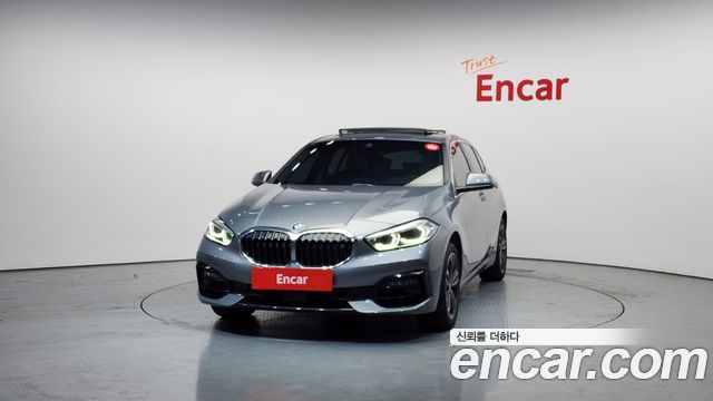 BMW 1-Series 2023 — photo 3