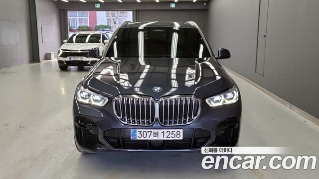BMW X5 2022 — photo 1