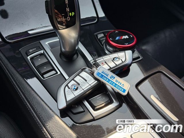 BMW 5-Series 2014 — photo 17