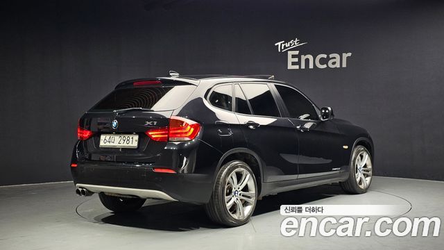 BMW X1 2011 — photo 2