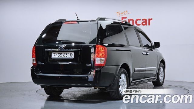 Kia Canival 2013 — photo 2