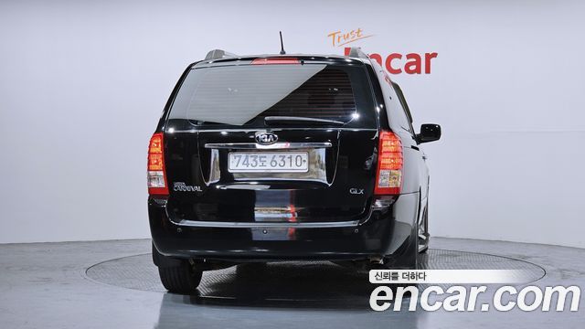 Kia Canival 2013 — photo 4