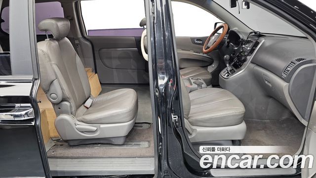 Kia Canival 2013 — photo 10