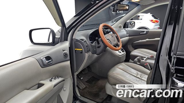 Kia Canival 2013 — photo 11