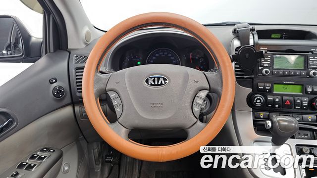 Kia Canival 2013 — photo 12