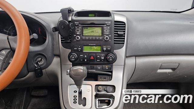 Kia Canival 2013 — photo 14