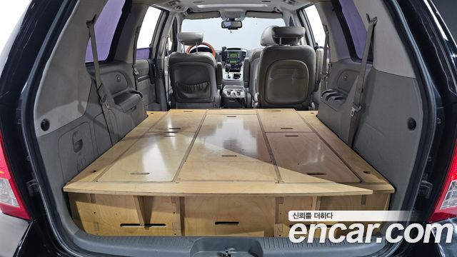 Kia Canival 2013 — photo 20
