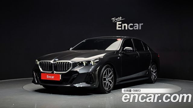 BMW 5-Series 2024 — photo 1