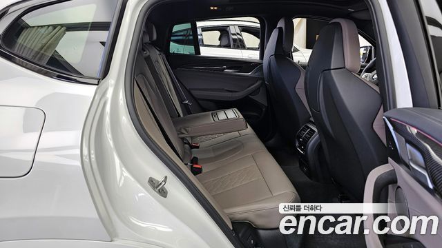 BMW X4M 2025 — photo 12