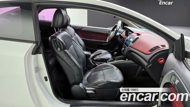 Kia Porte 2012 — photo 12