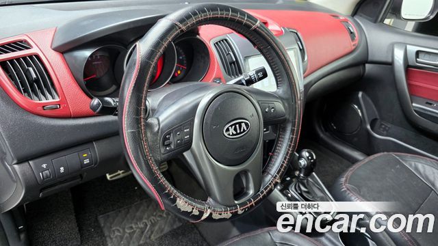 Kia Porte 2012 — photo 13