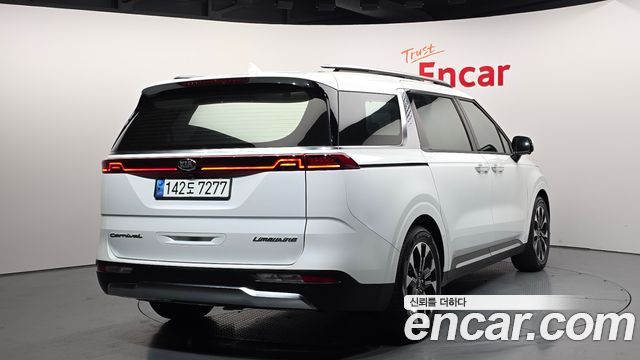 Kia Canival 2021 — photo 2