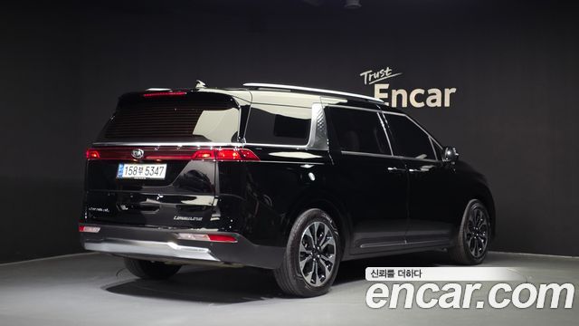Kia Canival 2021 — photo 2