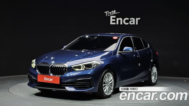 BMW 1-Series 2021 — photo 1