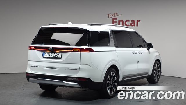 Kia Canival 2021 — photo 2