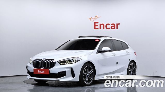 BMW 1-Series 2022 — photo 1