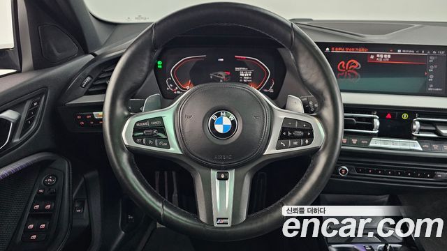 BMW 1-Series 2022 — photo 18