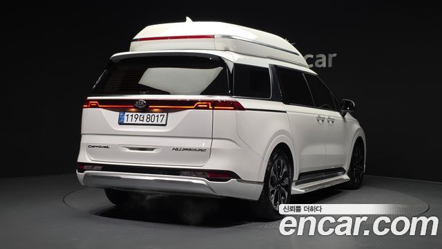 Kia Canival 2021 — photo 2