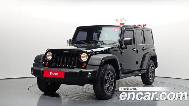 Jeep Wrangler 2013 — photo 1