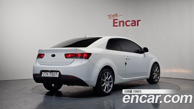 Kia Porte 2011 — photo 2