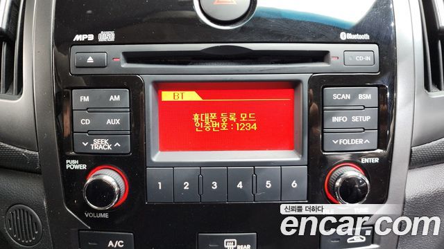 Kia Porte 2011 — photo 18