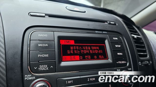 Kia K3 2015 — photo 21