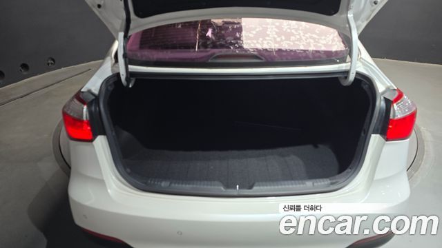 Kia K3 2015 — photo 26