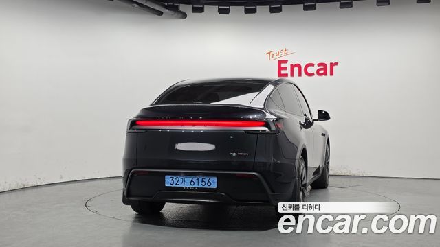 Tesla Model Y 2025 — photo 4