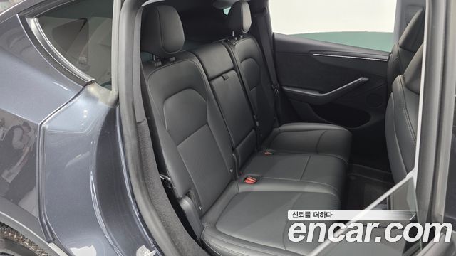 Tesla Model Y 2025 — photo 17