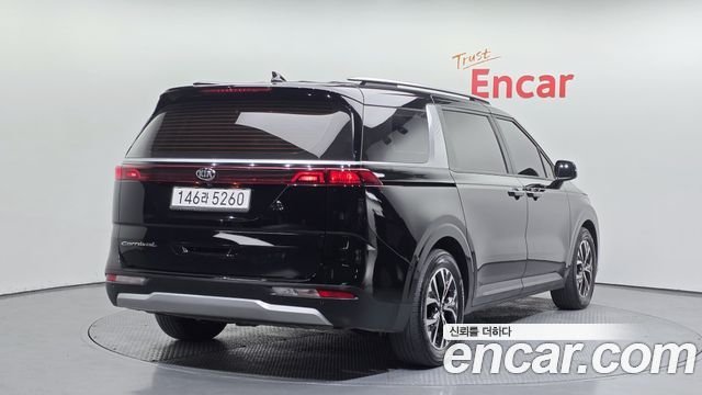 Kia Canival 2021 — photo 2
