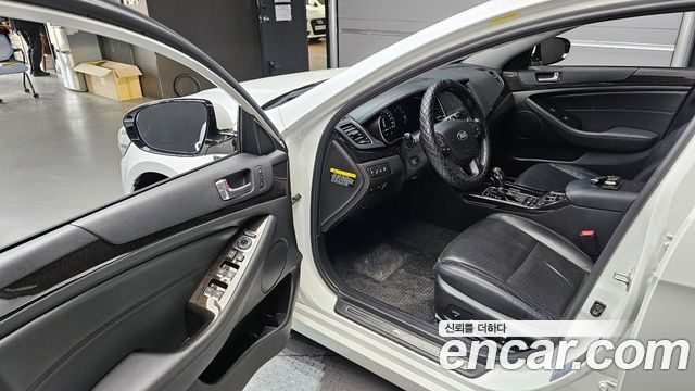 Kia K7 2014 — photo 13