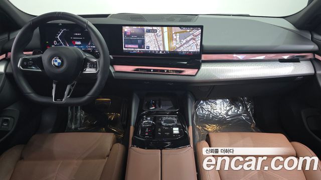BMW 5-Series 2024 — photo 10