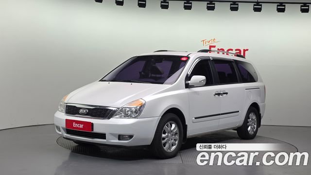 Kia Canival 2013 — photo 1