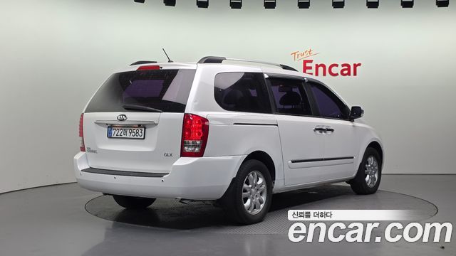 Kia Canival 2013 — photo 2