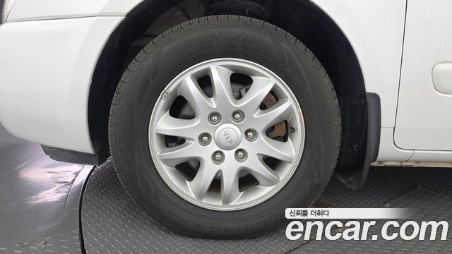 Kia Canival 2013 — photo 5