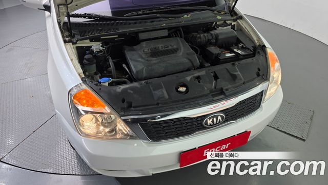 Kia Canival 2013 — photo 6